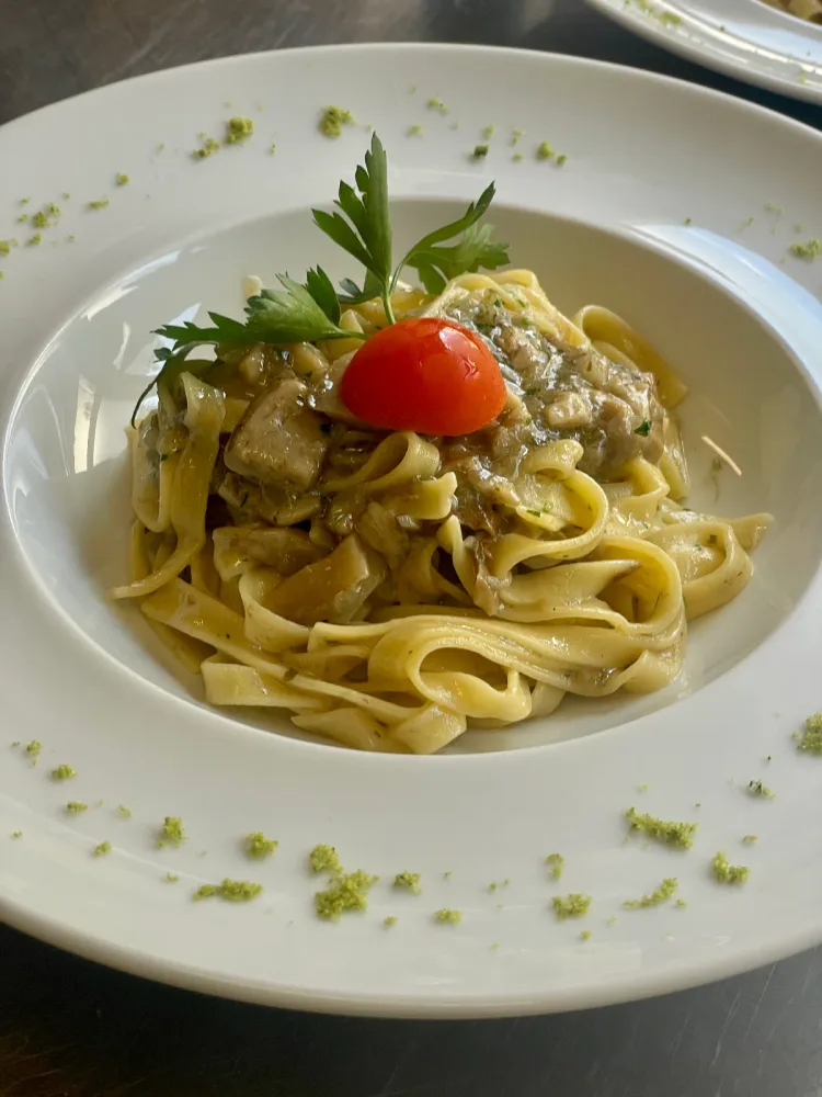 Homemade tagliatelle with porcini mushrooms